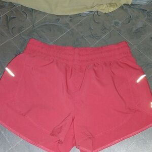 Orangish color All in motion size Medium athletic shorts with inner panties